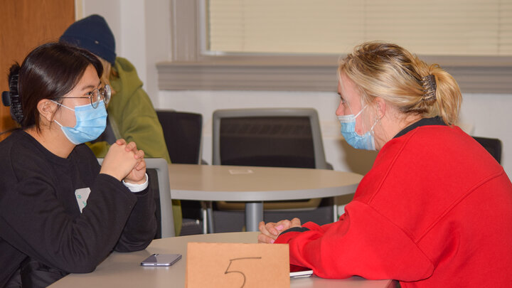 Students from the Intensive English Program and a communications studies course conversed with one another as part of a joint class session that bridged connections between domestic and international students. // Mia Azizah, Global Affairs