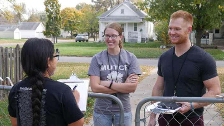 Nebraska graduate students conduct a door-to-door survey of Lincoln residents. The survey results were used to create a database that can be used by community planners for neighborhood improvements.