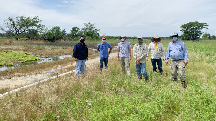 UNL researchers exploring suitable sites for deployment of the wireless-based sensor networks.